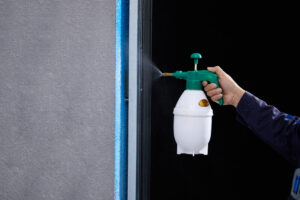 15 Spray water to moisten the caulking area